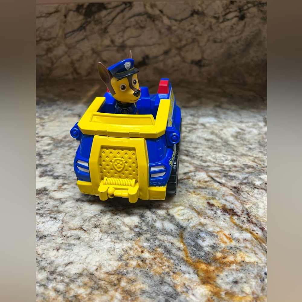 Paw patrol Chase’s Blue and Yellow rescue vehicle